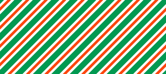 Poster - Christmas seamless pattern. Red and green diagonal stripes background. Candy cane repeating decoration wallpaper. Winter holiday lines backdrop. Xmas peppermint present wrapping print design. Vector