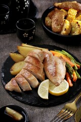 chicken steak for diet served with potatoes and vegetables