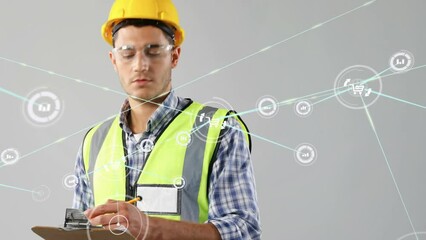 Poster - Animation of connected icons, caucasian engineer wearing helmet and spectacles writing in notepad