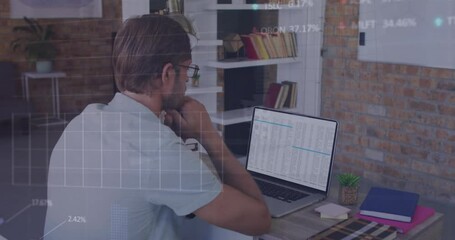 Poster - Animation of graphs and trading boards over caucasian man analyzing data in laptop