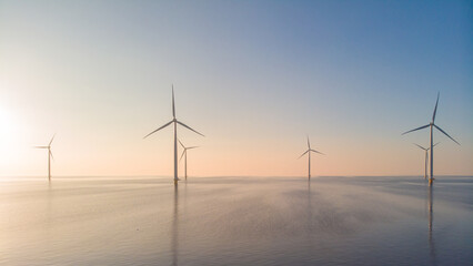 offshore windmill park, windmill park in the ocean aerial view with wind turbine flevoland netherlan