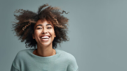 Wall Mural - Black woman in blue sweater, candid lifestyle photo