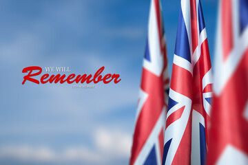 Wall Mural - Flag of Great Britain with Text on background of blue sky. Holidays of the UK. Remembrance Day.