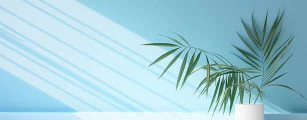 Sticker - Palm leaves in a pot on the background of a light blue wall illuminated by the sun, legal AI