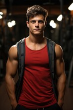 A Man In A Red Tank Top Is Posing For A Picture. Digital Image.