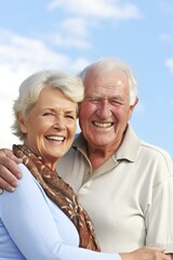 Wall Mural - portrait of a happy senior man and woman posing together outside