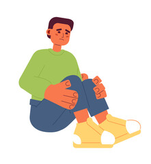 Fototapete - Sad hispanic boy semi flat color vector character. Scared young man sitting hugging knees. Editable full body person on white. Simple cartoon spot illustration for web graphic design