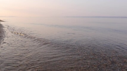 Wall Mural - a sunset on the sea beach