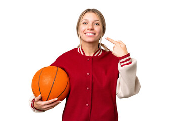 Wall Mural - Young hispanic woman playing basketball over isolated white background giving a thumbs up gesture