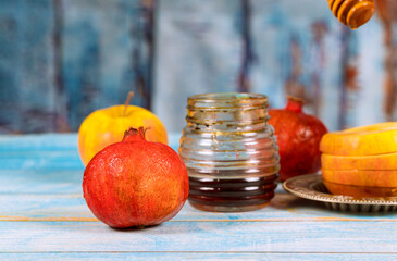 Wall Mural - Rosh hashanah jewish new year celebration its traditional symbolswith apples, honey, pomegranate, Shofar