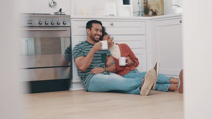 Poster - Drink, coffee and couple relax in kitchen on floor together in conversation, communication or bonding with beverage. Drinking, tea or people talking with hot chocolate in home on weekend or holiday