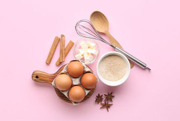 Wall Mural - Composition with ingredients for preparing bakery on pink background