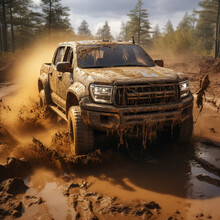 A Pickup Truck Running Through The Mud
