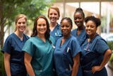 Fototapeta Do akwarium - A group of nurses in a team photo. Professional healthcare services.