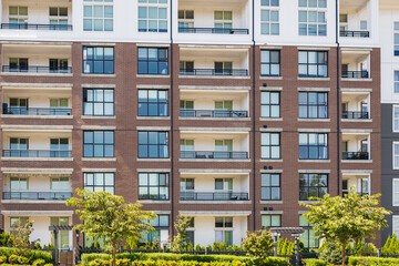 Wall Mural - Brand new apartment building on summer. Canadian modern residential architecture. Modern complex of apartment buildings