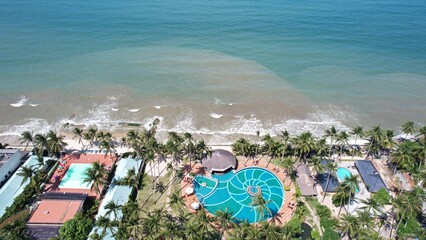 Wall Mural - Aerial view of Swimming pool and the beach in the Phan Thiet resort, Binh Thuan Province, Viet Nam