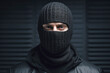 © Firn - Portrait of man with face covered by black ski mask