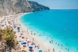 Fototapeta Big Ben - Beautiful beach in the island of Lefkada. Busy beach in august.
