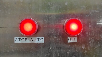 Wall Mural - industrial sign background of red colour of button indicator stop and off light machine in the factory