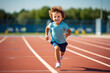© AspctStyle - Little child running filled with joy and energy running on athletic track, young boy runner training on the stadium. Concept of sport, fitness, achievements, studying