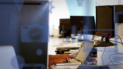 Poster - Animation of multiple icons over caucasian man typing on keyboard of laptop in office