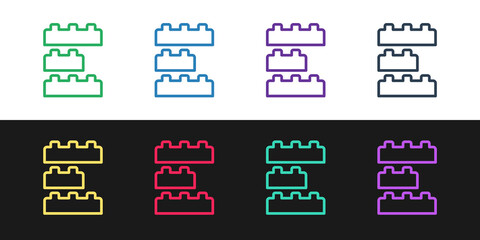 Poster - Set line Toy building block bricks for children icon isolated on black and white background. Vector