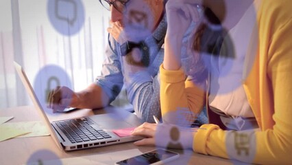 Poster - Animation of icons and computer language, caucasian coworkers discussing reports on laptop