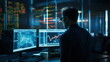 © DanChik - An analyst in a data-centric environment in a business suit analyzes graphs and charts on a monitor