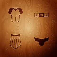 Sticker - Set Men underpants, T-shirt, Skirt and Belt on wooden background. Vector