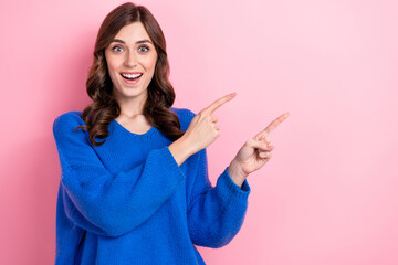 Poster - Photo of overjoyed cheerful girl wearing stylish blue clothes presenting empty space black friday price isolated on pink color background