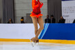 © Real Sports Photos - girl figure skater axel jump in bright red dress, figure skating single