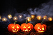 Halloween pumpkins with lights and smoke