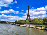 Fototapeta Paryż - Eiffel tower and Seine river, seen from Bir-Hakeim bridge, Paris, France