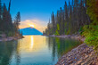 Sunrise peaking over Mount Murry on Hungry Horse Reservoir in the Flathead National Forest, MT.