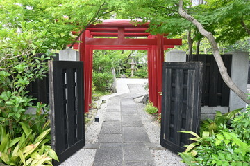 Sticker - Vermilion torii of a Japanese shrine. Vermilion is used because the ancient Japanese wished the color of the image of the sun (god) to bring the dynamism of life.