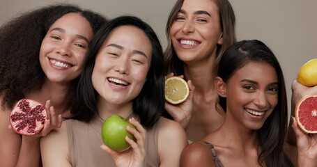 Poster - Women, portrait and beauty, diversity and fruit with dermatology and friends on studio background. Unique skin, natural cosmetics and inclusion, eco friendly skincare, smile and citrus for vitamin c