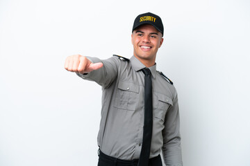 Wall Mural - Young caucasian security man isolated on white background giving a thumbs up gesture