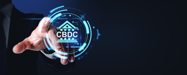 Poster - Businessman finger touch CBDC glowing hologram with bank icon