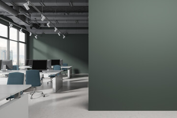 Green workspace interior with pc computer on desk in row, mock up wall