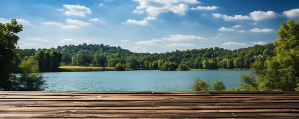 Lakeside wooden deck with a clear sky.