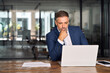 © Stock 4 You - Mature Indian or Latin business man ceo trader using computer, typing, working in modern office, doing online data market analysis, thinking planning tech strategy looking at laptop with copy space.
