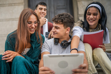 Poster - group of students sit in front of school watch video on digital tablet