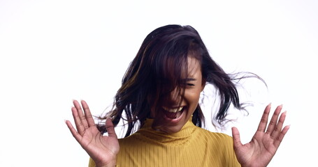 Sticker - Smile, crazy and a woman with wind on a white background for beauty, hair or comedy. Happy, model and an Indian girl or person with bad weather, fun or excited while isolated on a studio backdrop