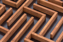 Brown Wooden Maze On Dark Dirty Background