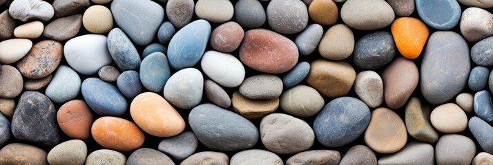 Pebbles or river stones for background, top view panorama
