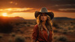 © ArturSniezhyn - Beautiful girl with a smile on her face in a cowboy hat on the background of a beautiful sunset.