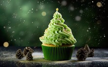 Christmas Tree On Cupcake, Delicious Xmas Muffin With Green Icing. Green Cream Shaped Like A Christmas Tree On Cupcake, Cake To Celebrate Seasonal Holiday.