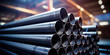 A stack of steel pipes in a warehouse or factory with a blurry background.