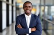 © FACTORY GRAPHICA  - a black skin businessman smile negro tribe