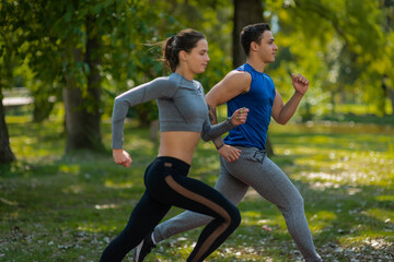 Young athletes jogging in the park